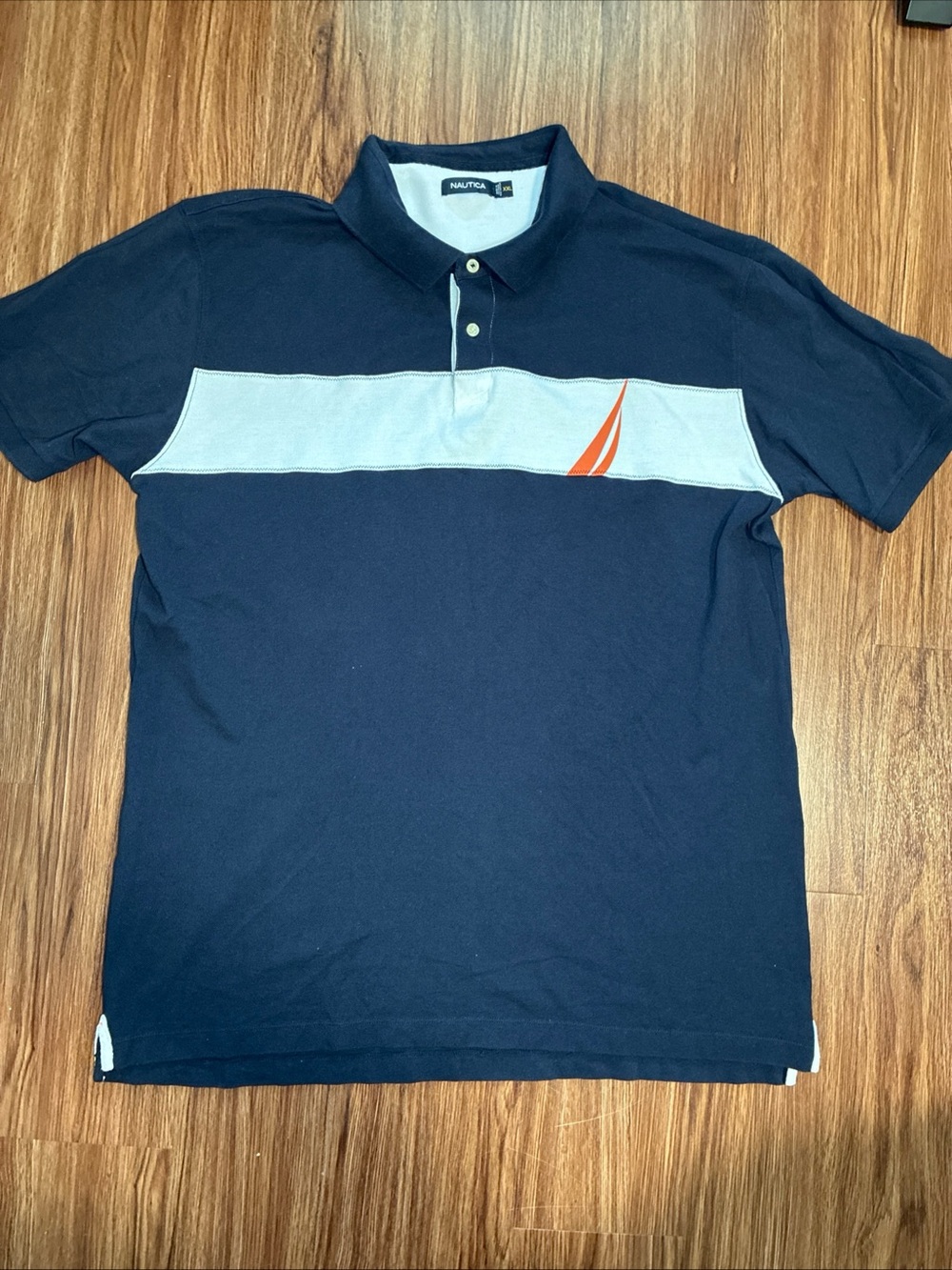 Nautica Men's Navy Polo with White Chest Panel and Orange Sail